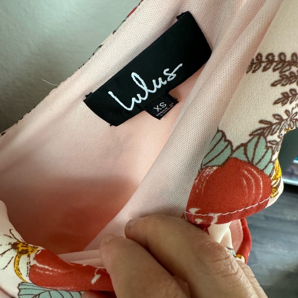 Lulus orange midi dress with cute ruffles on the sleeve in XS size